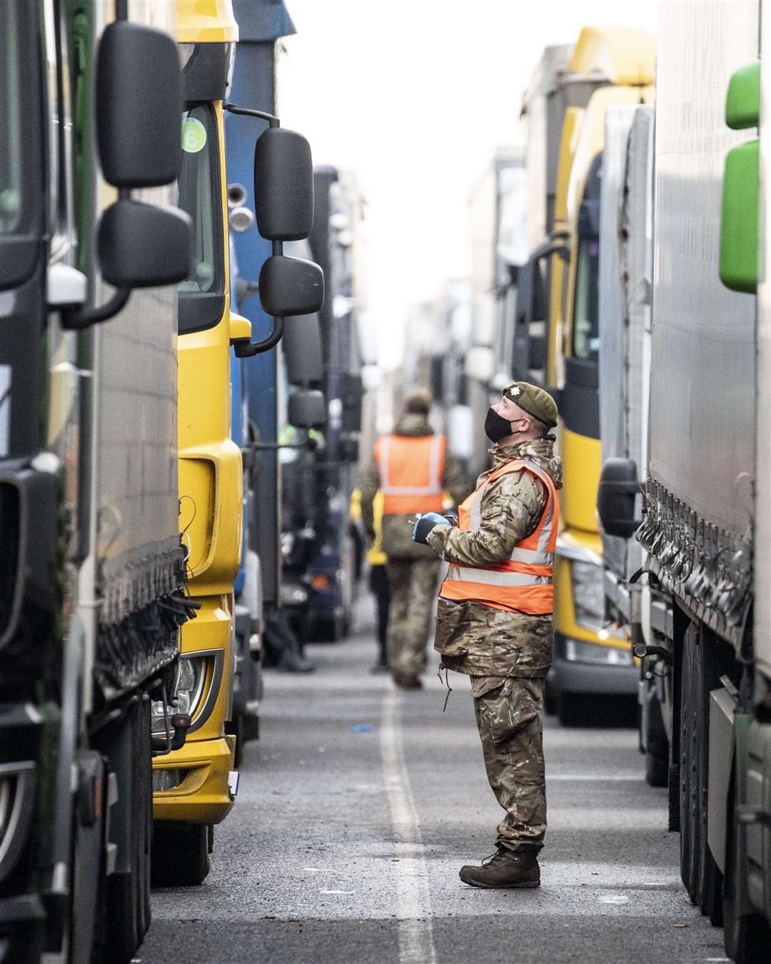 Army soldiers deliver Covid-19 tests to lorry drivers at Manston airfield in Kent (MoD/PA)