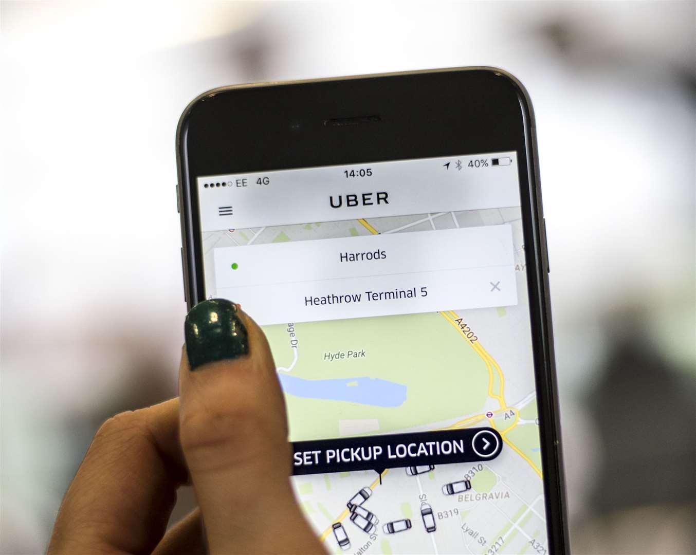 Uber rides are booked through a smartphone app, which connects passengers to drivers (Lauren Hurley/PA)