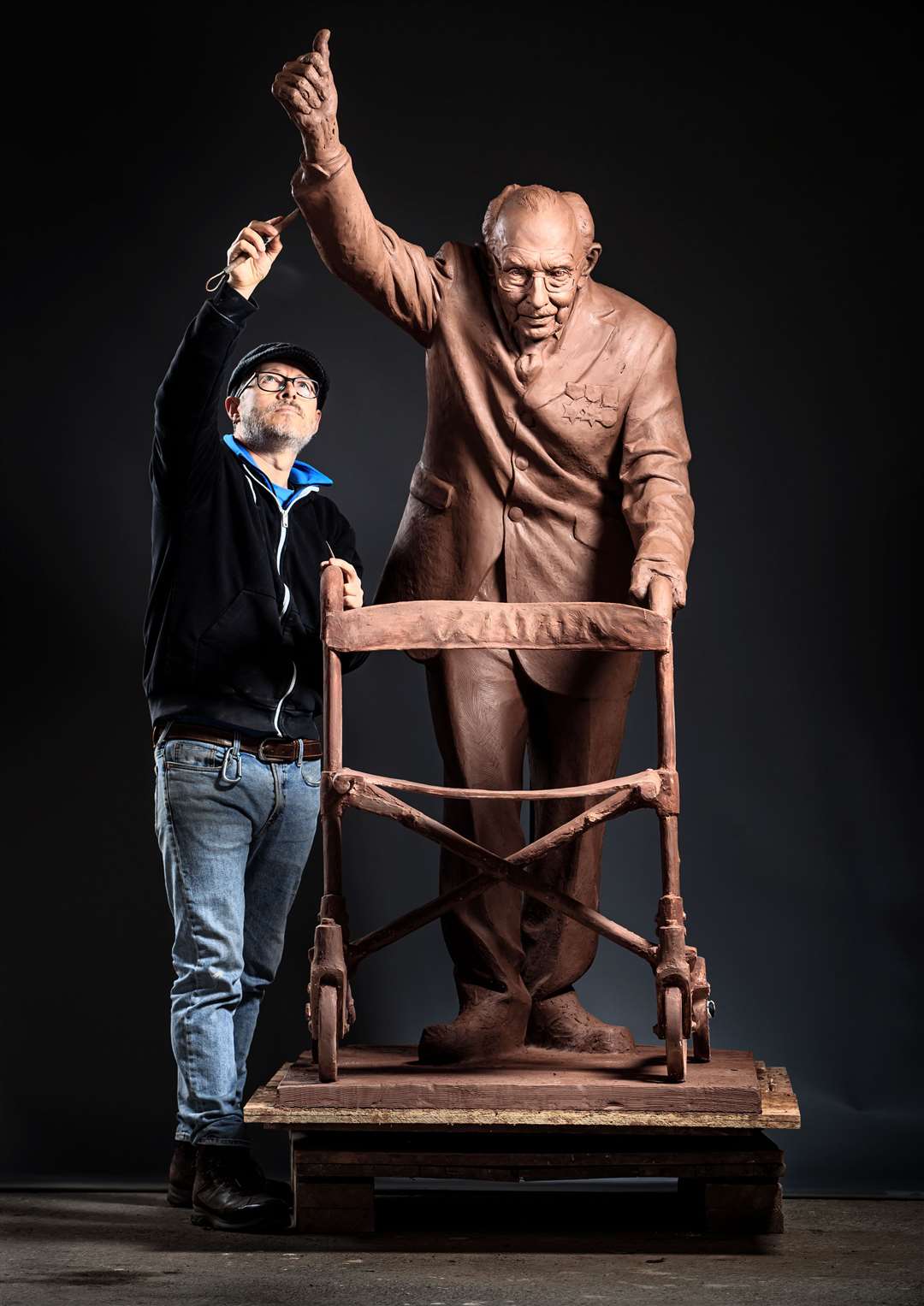 The statue portrays the Second World War veteran giving a thumbs-up after completing 100 laps of his garden in aid of the NHS (Danny Lawson/PA)