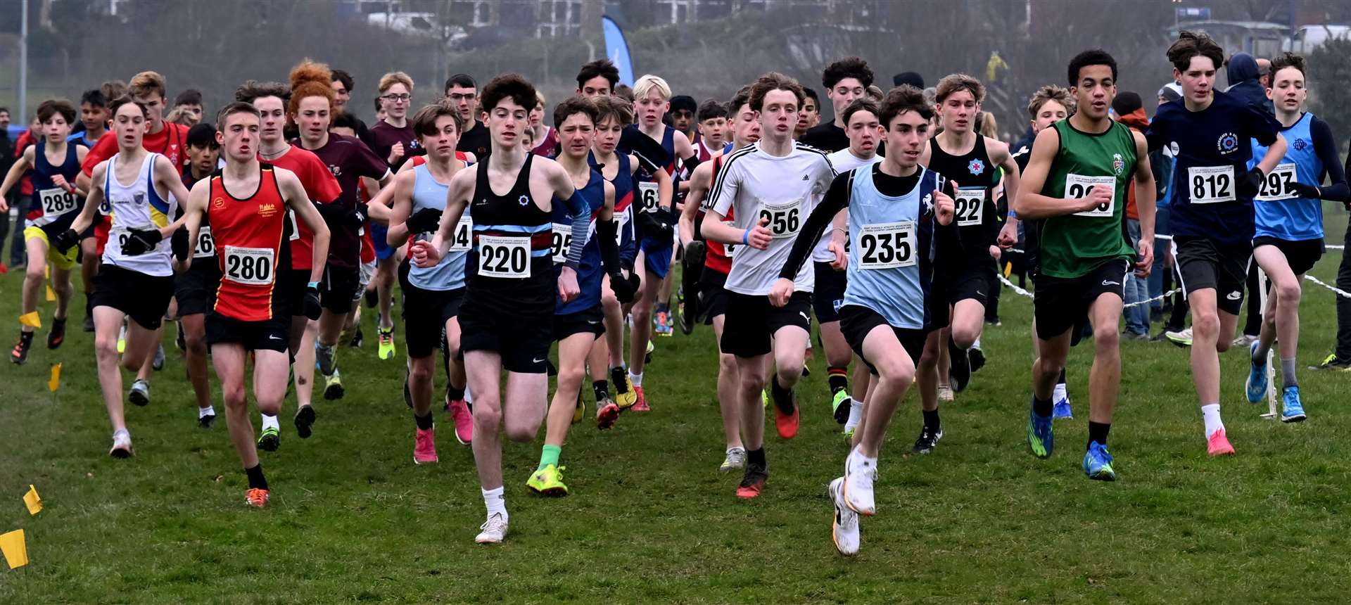 Vincent Senechal (No.235) hits his stride in the junior boys’ race for Canterbury & St Augustines. Picture: Simon Hildrew