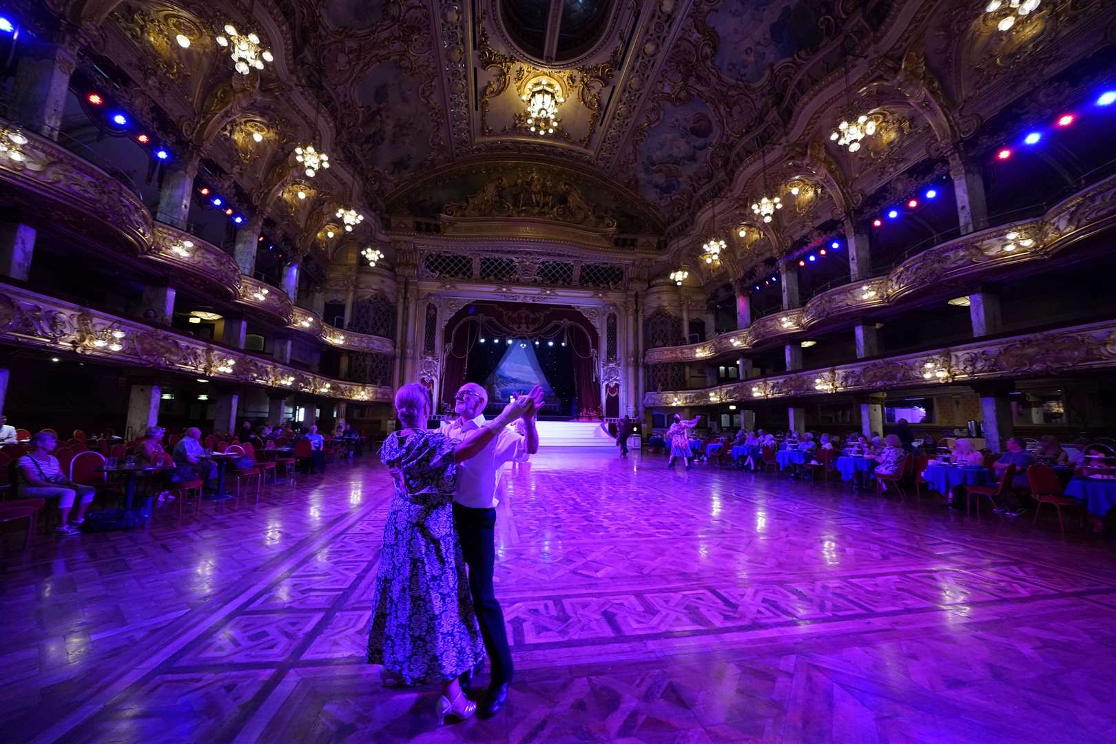 A couple dancing in the Blackpool Tower Ballroom (Peter Byrne/PA)