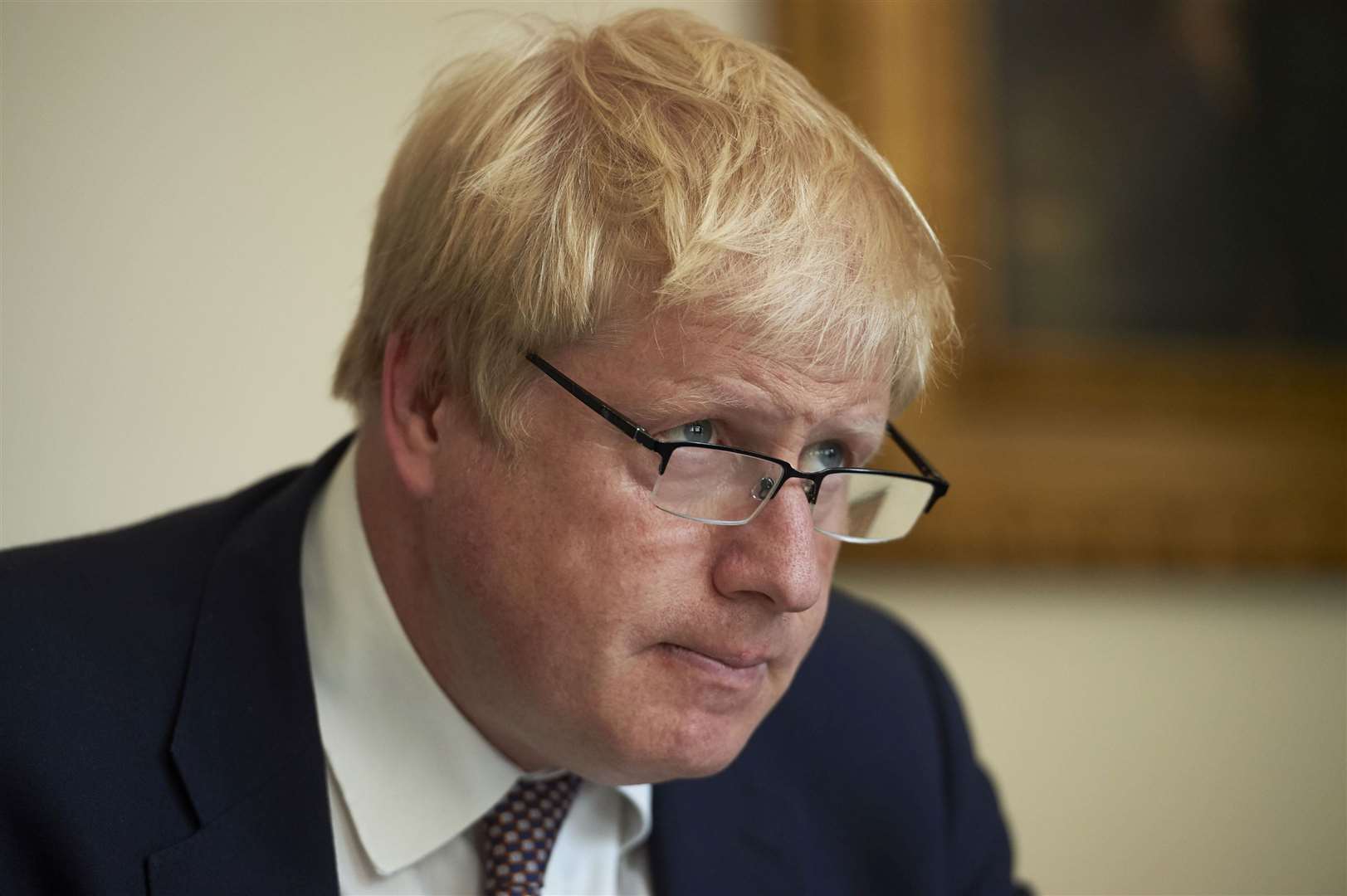 Mr Johnson wearing his glasses when he was foreign secretary (Niklas Halle’n/PA)