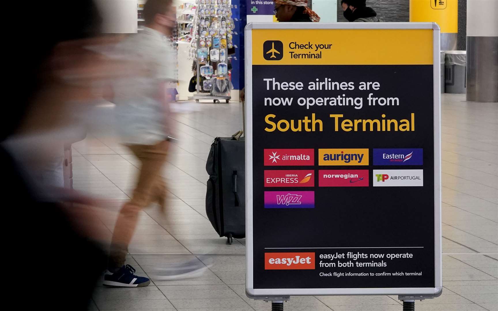 Passengers arrive at the South Terminal of Gatwick Airport (Gareth Fuller/PA)