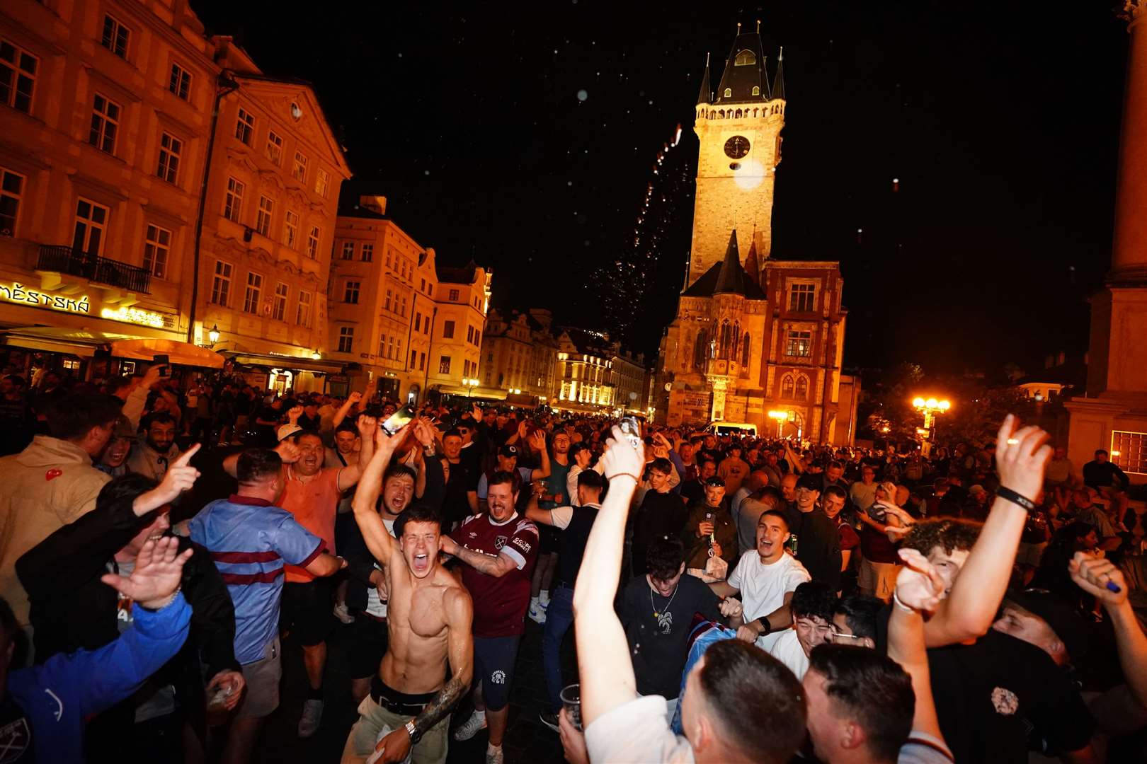 West Ham United fans celebrate in Staromestske Namesti, Prague, after their team won the Uefa Europa Conference League final (James Manning/PA)