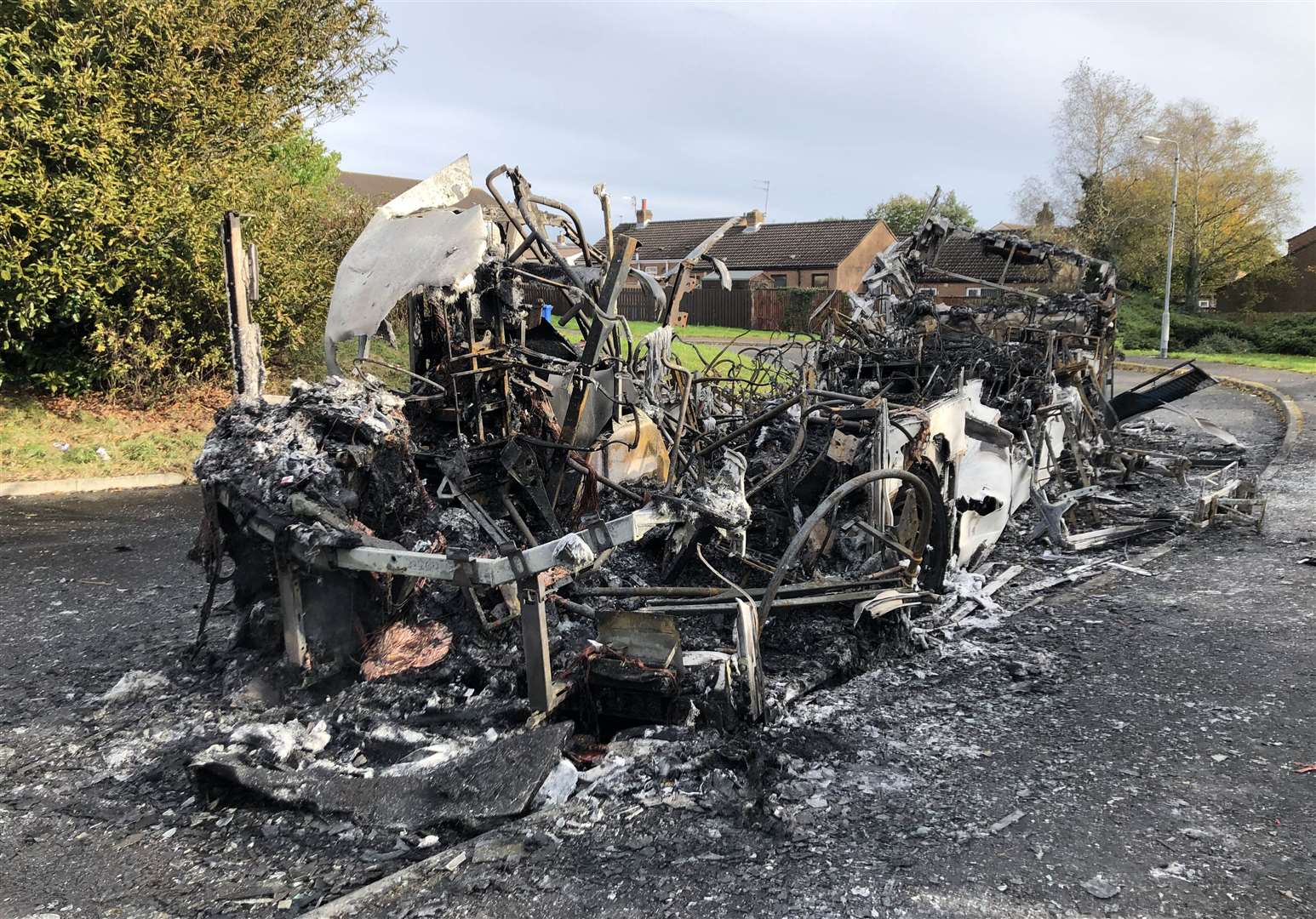 The scene on Abbott Drive in Newtownards last week after a bus was hijacked and set alight in an attack linked to loyalist opposition to Brexit’s Northern Ireland Protocol (David Young/PA) 