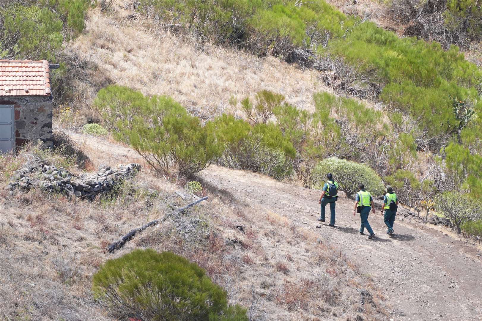 Members of a search and rescue team near the last known location of Jay Slater (James Manning/PA)