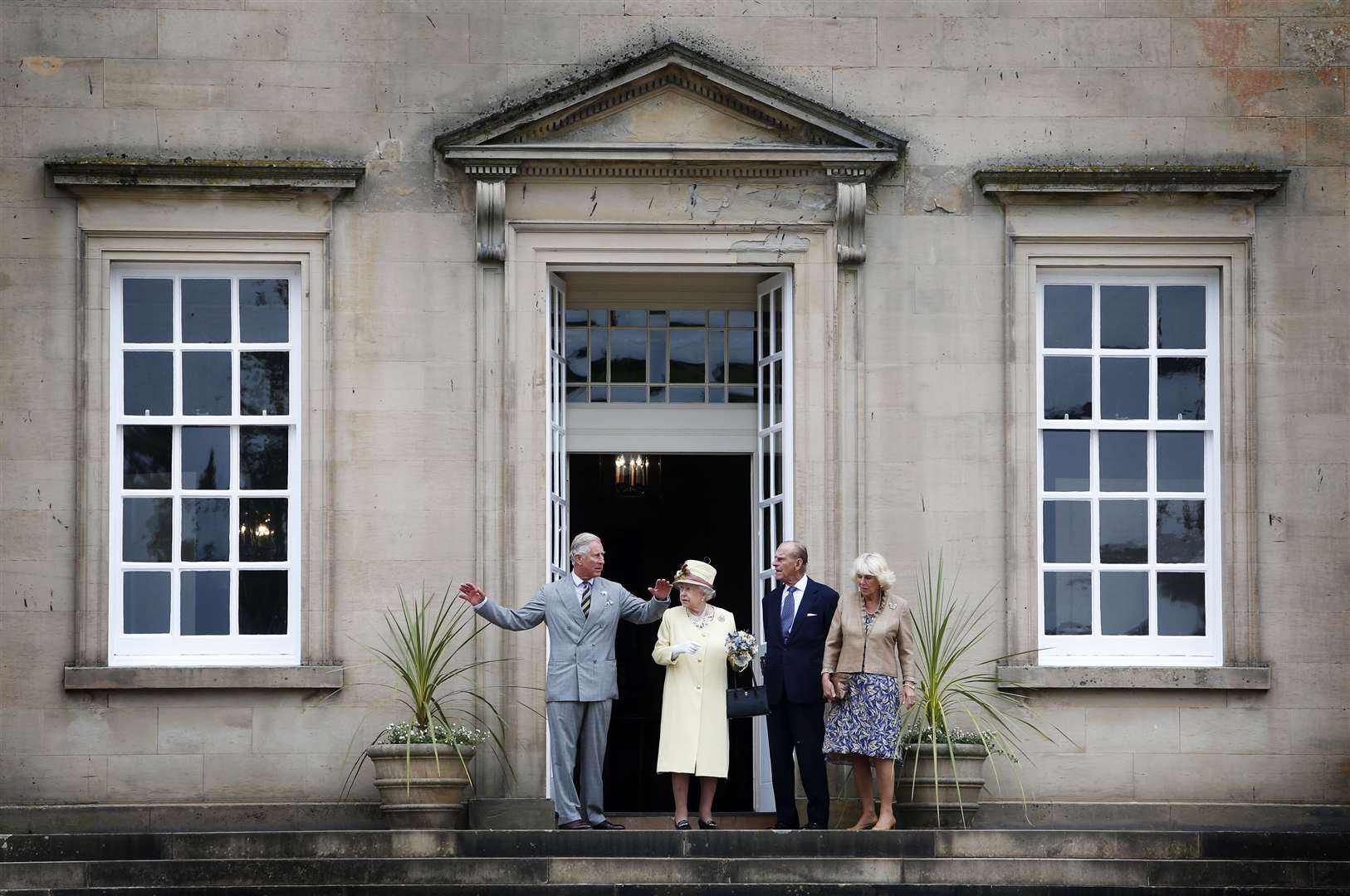 The Queen, Duke of Edinburgh and Charles and Camilla at Dumfries House, which is due to reopen to the public next week (Danny Lawson/PA)