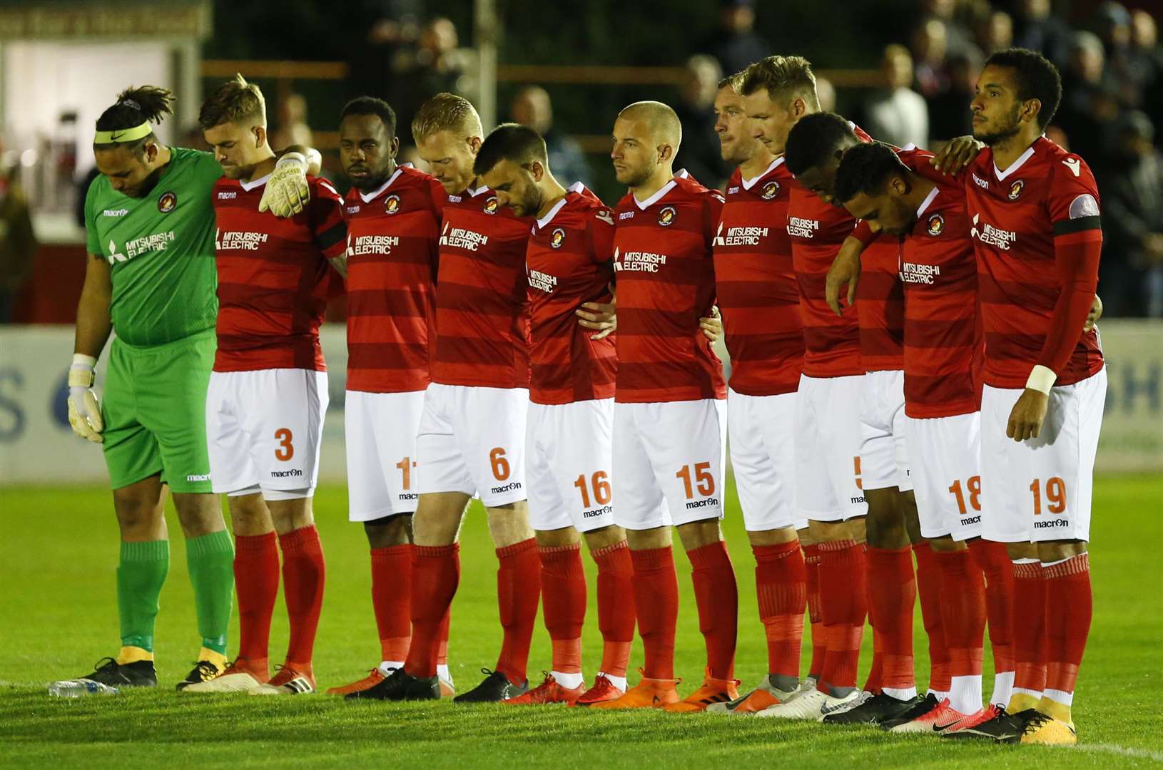 Ebbsfleet's players observing a minute's silence earlier this season. Picture: Andy Jones