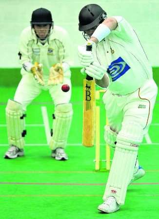 Canterbury's Simon Smith keeps wicket as Bexley's James Harris plays defensively