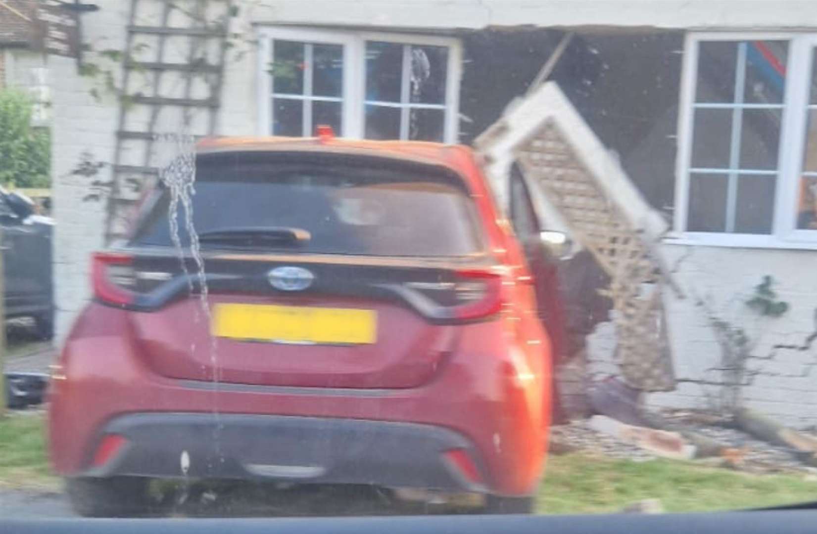 A car ploughed into a house in Chequer Tree Farm Road, Mersham, on Wednesday afternoon