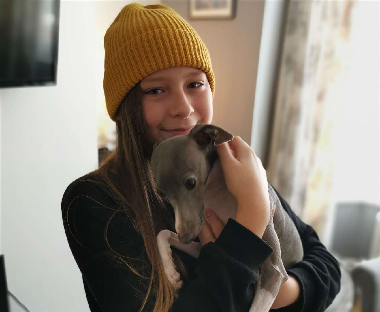 Ashley with her beloved Italian greyhound Django