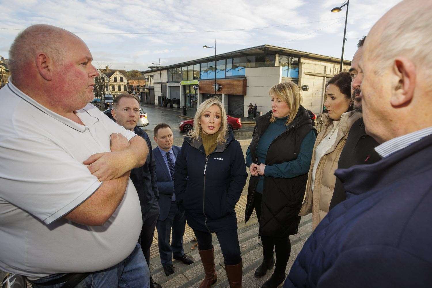 Michelle O’Neill (centre) speaking to Downpatrick residents (Liam McBurney/PA)