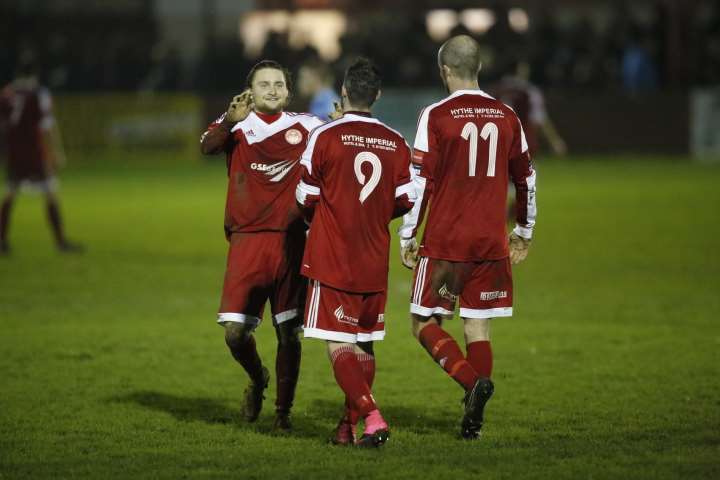 Alfie May and Frankie Sawyer (9) celebrate with Darren Marsden. Picture: Martin Apps.