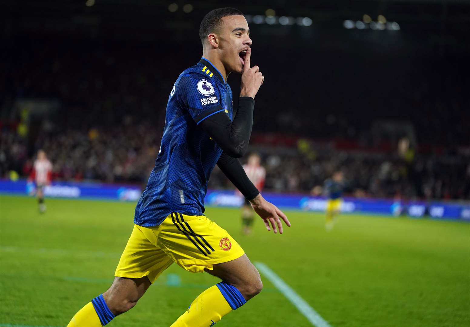 Manchester United’s Mason Greenwood celebrates scoring the second goal of the game during a Premier League match against Brentford in January (PA)