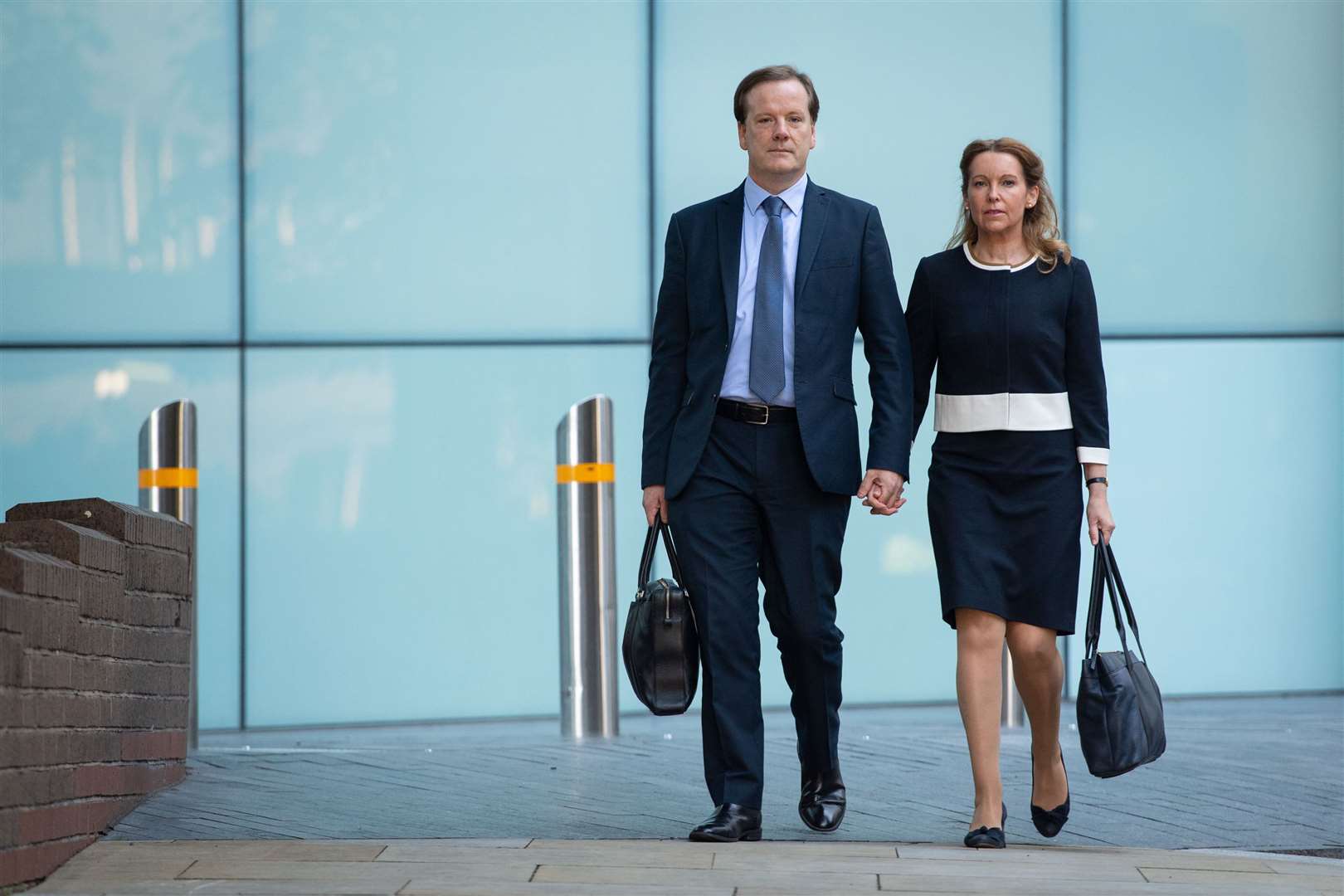 Former Conservative MP Charlie Elphicke, with MP for Dover Natalie Elphicke, arriving at Southwark Crown Court on Wednesday (Dominic Lipinski/PA)