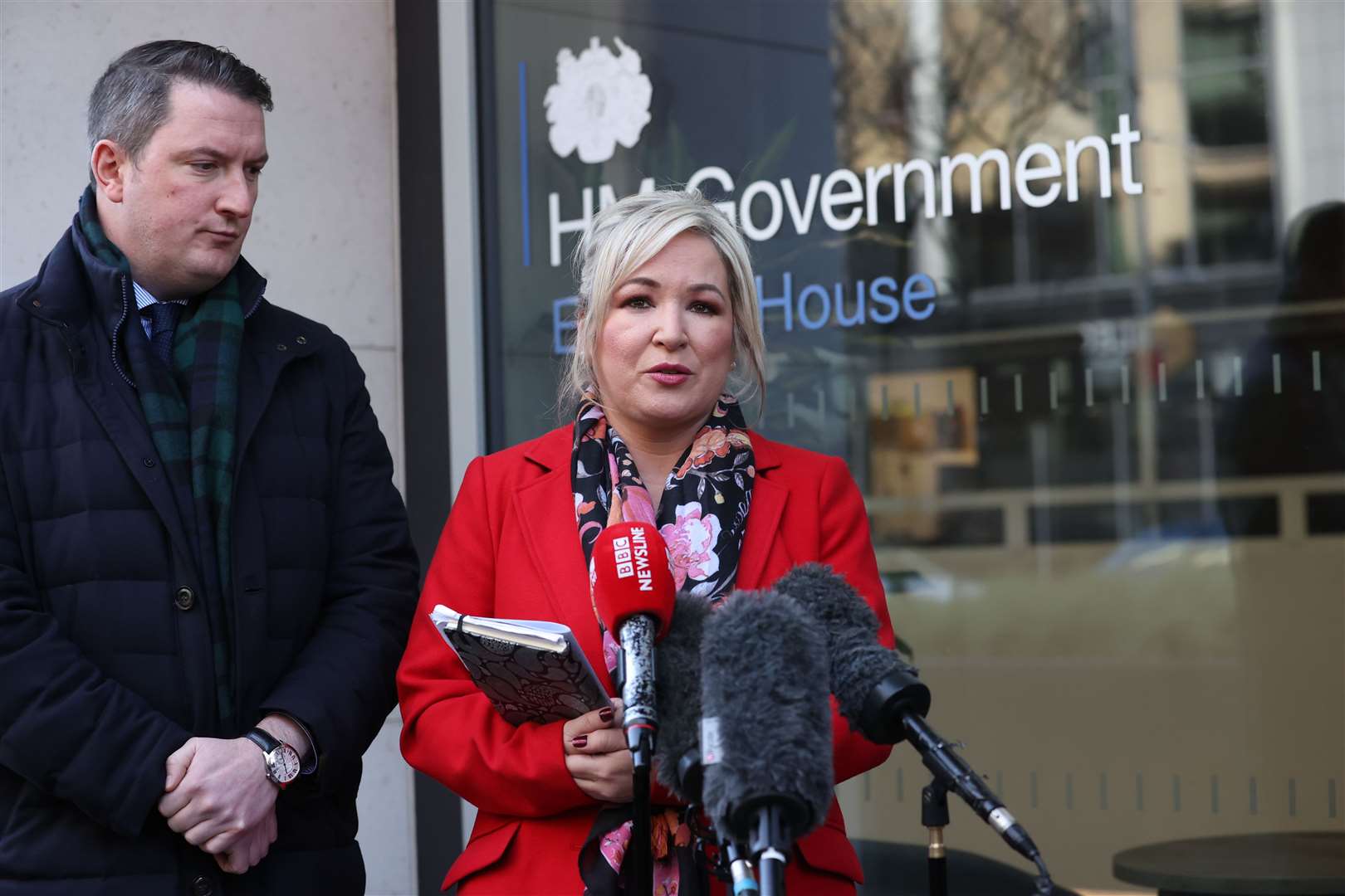 Sinn Fein vice president Michelle O’Neill, with John Finucane, speaking to the media outside Erskine House, Belfast (Liam McBurney/PA)