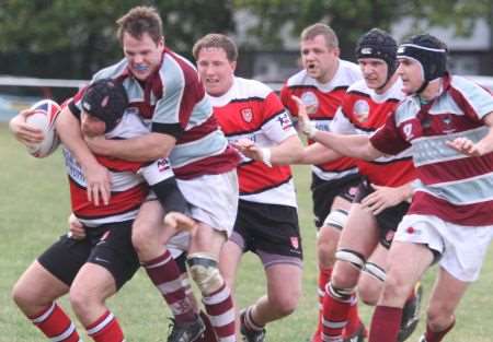 Maidstone (red and white) lost at home to Wimbledon