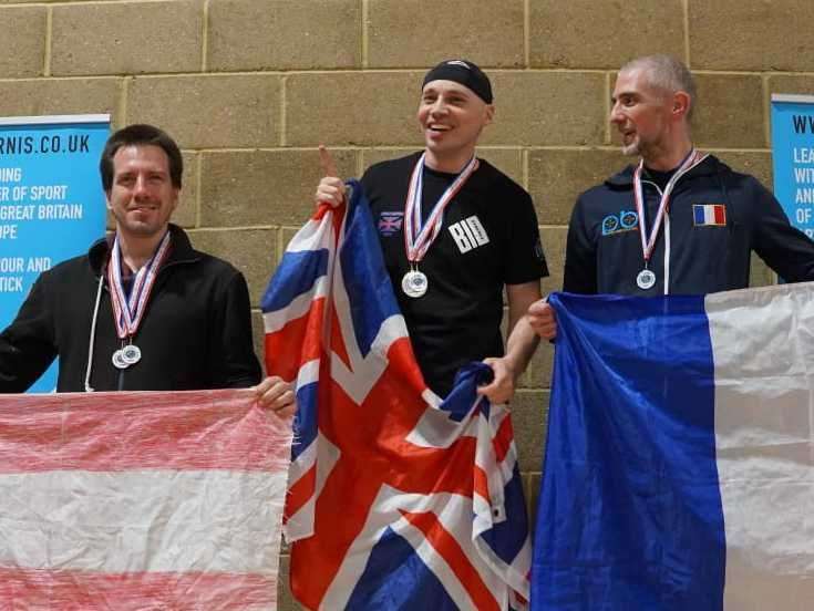 Family Martial Arts chief instructor Louis Tandoh on top of the pile in Luton last month