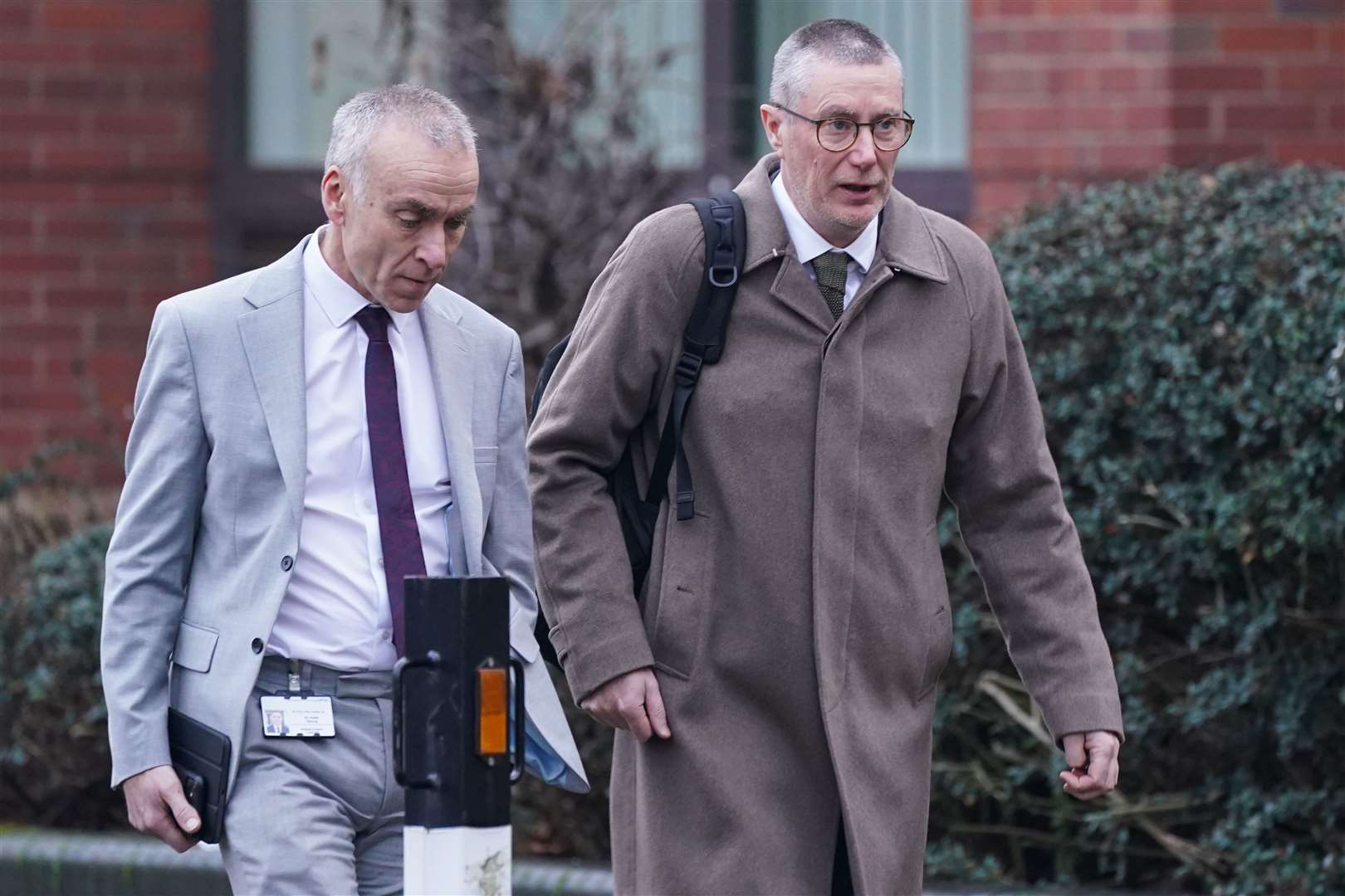 Chief executive of Nottingham University Hospital Trust Anthony May (right) arrives at Nottingham Magistrates’ Court (Jacob King/PA)