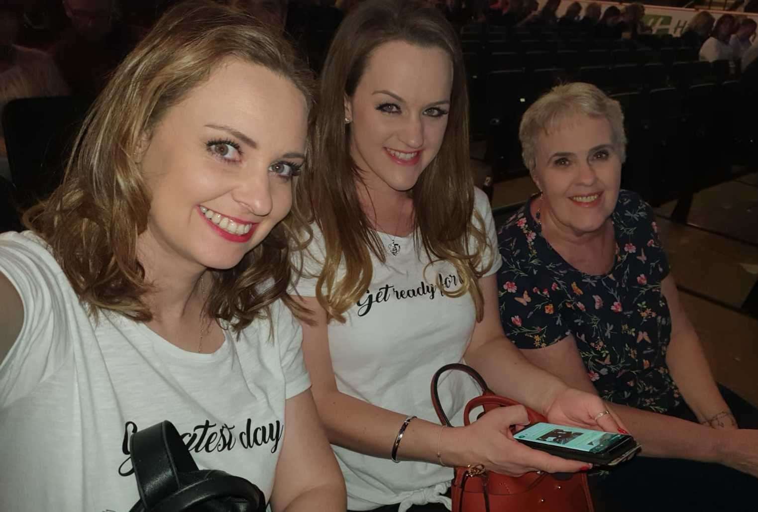 Victoria Whale, Gemma Purdy and Linda Purdy enjoy Take That in concert