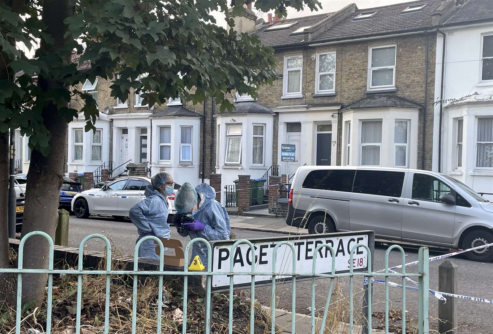 Forensics officers at the scene on Paget Terrace, near the scene in Eglinton Road, Woolwich, south-east London (PA)