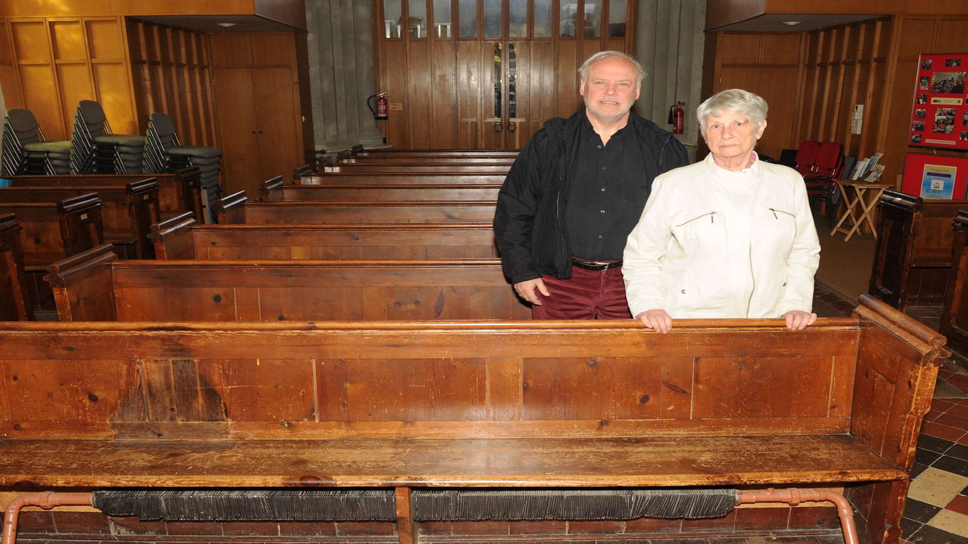 Church wardens Frank Pantony and Janet Willis with the 'uncomfortable' traditional pews