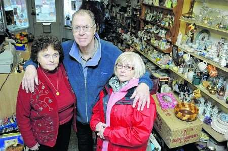 Volunteers Dorothy Bilney and John Bilney with manager Daphne Baker