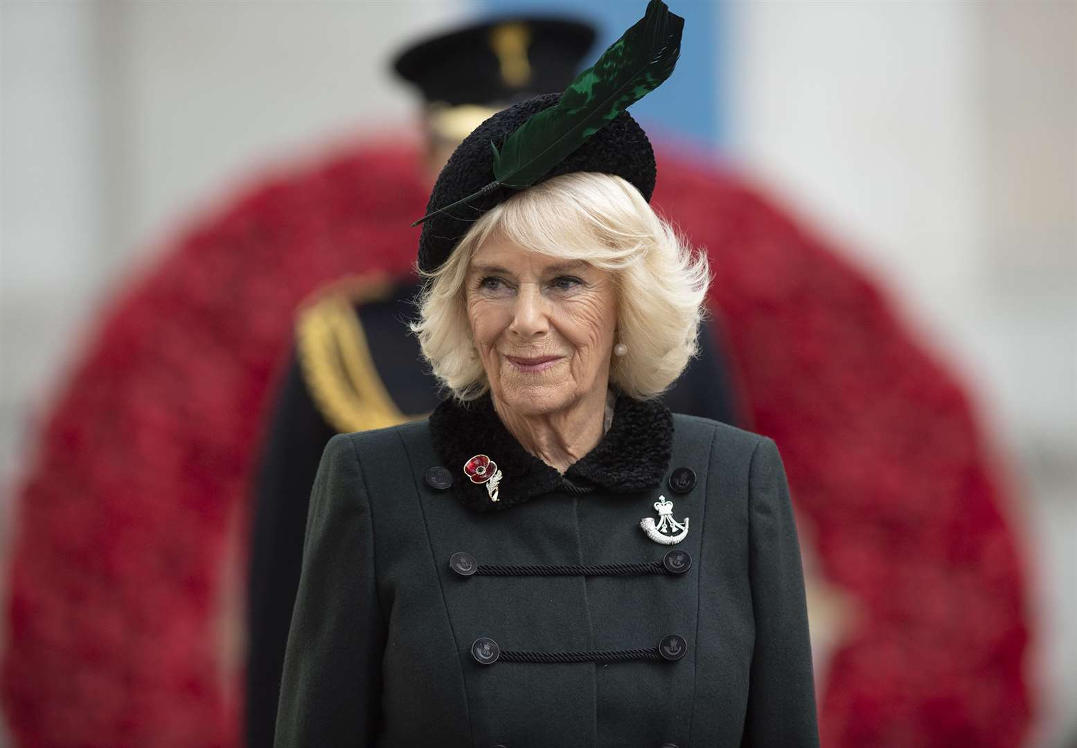 Camilla wearing the brooch as she visited the Field of Remembrance this week (Eddie Mulholland/The Daily Telegraph/PA)