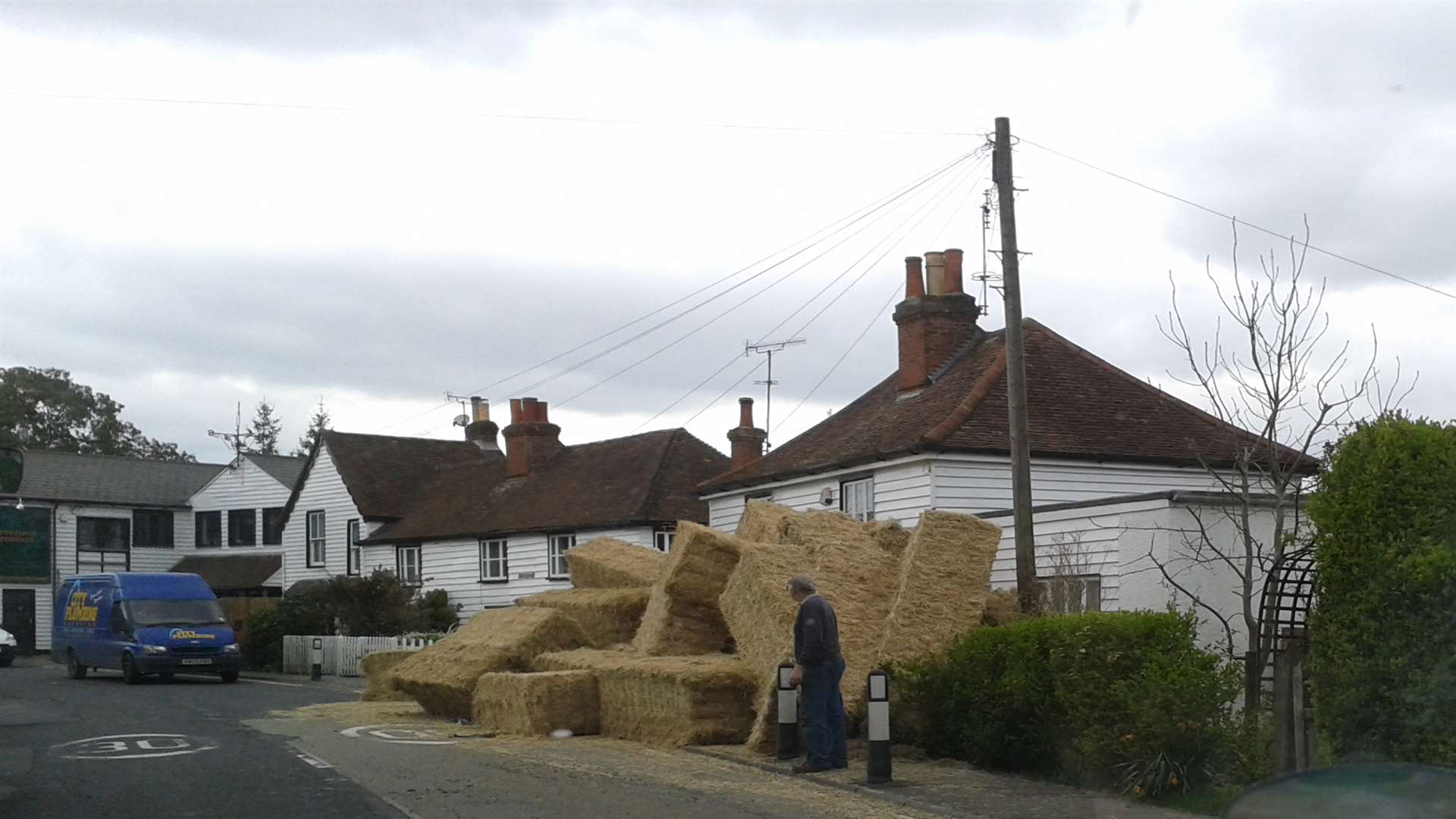 Bales of hay covered Mark Oliver's home. Pictures taken by Brenda Brower