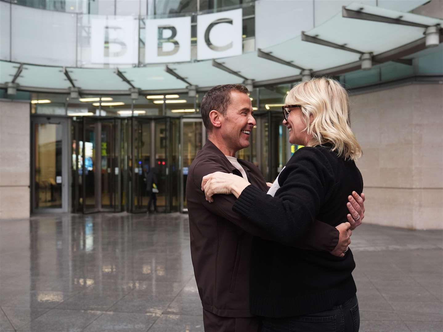 BBC Radio 2 presenters Zoe Ball and Scott Mills outside BBC Broadcasting House in London after Ball announced she was stepping down from the station’s breakfast show after six years and handing the reins to Mills (James Manning/PA)