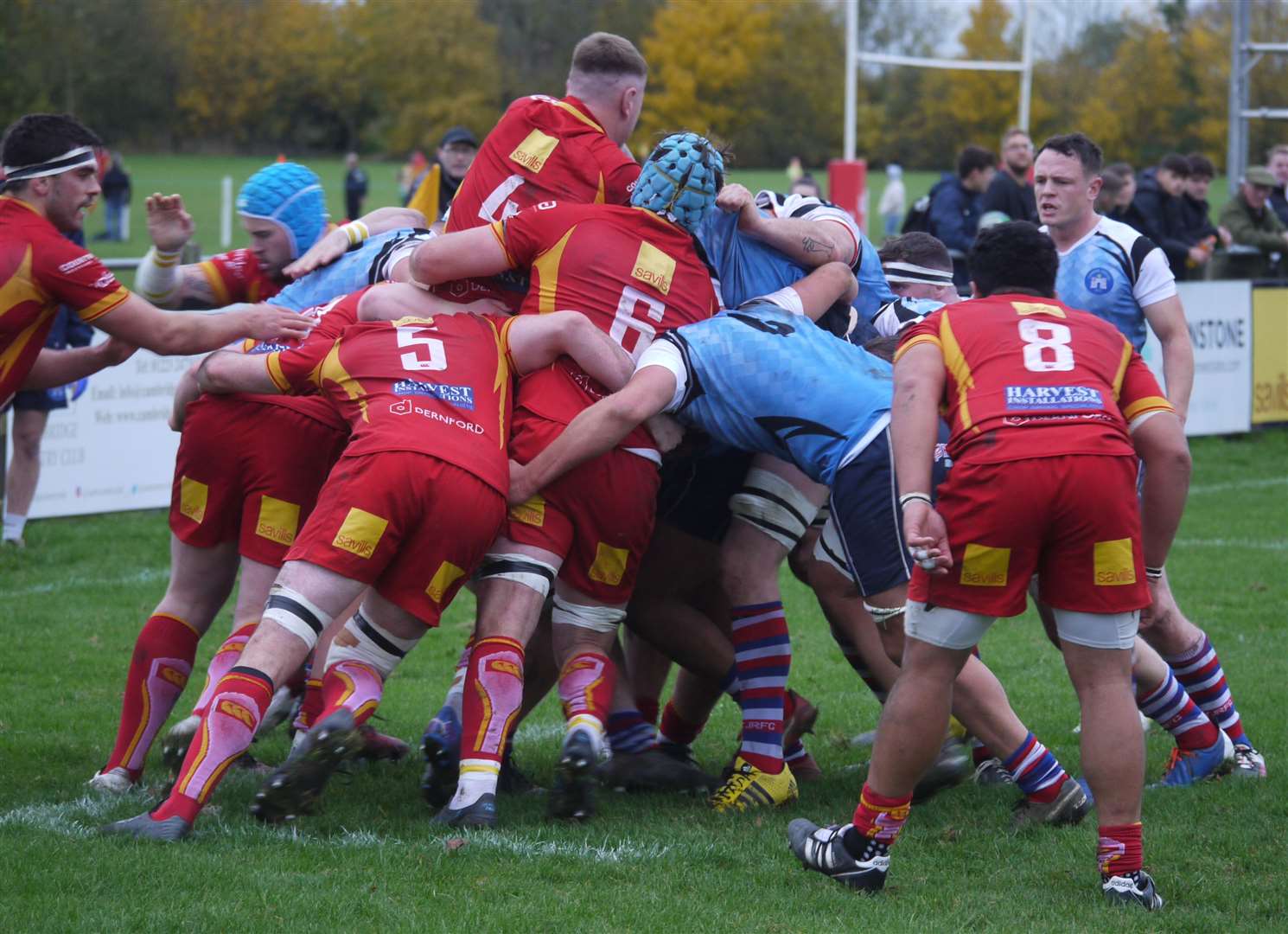 The Tonbridge Juddians (blue) and Cambridge forwards do battle