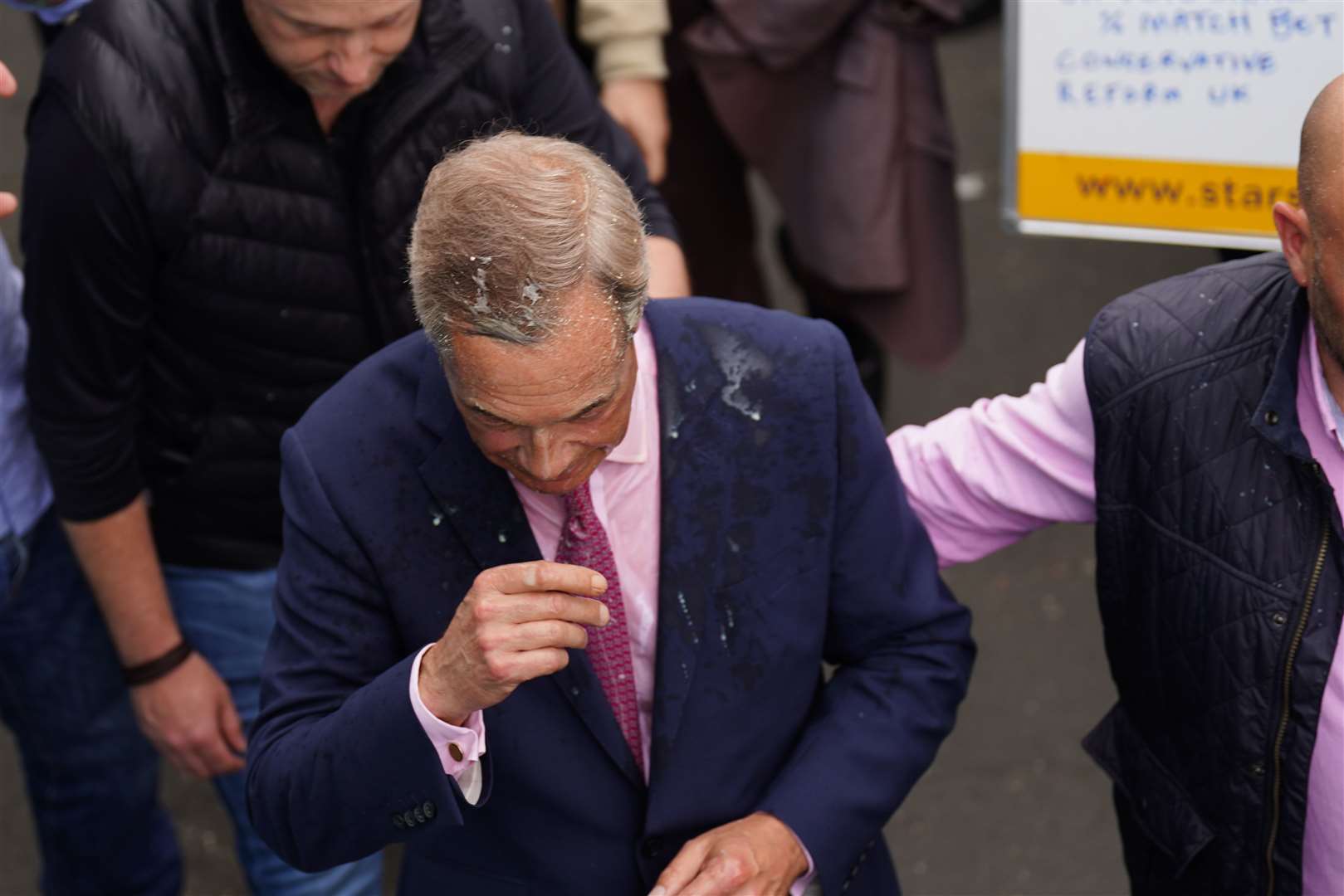 Nigel Farage had the milkshake thrown over him as he left the Moon and Starfish pub (James Manning/PA)