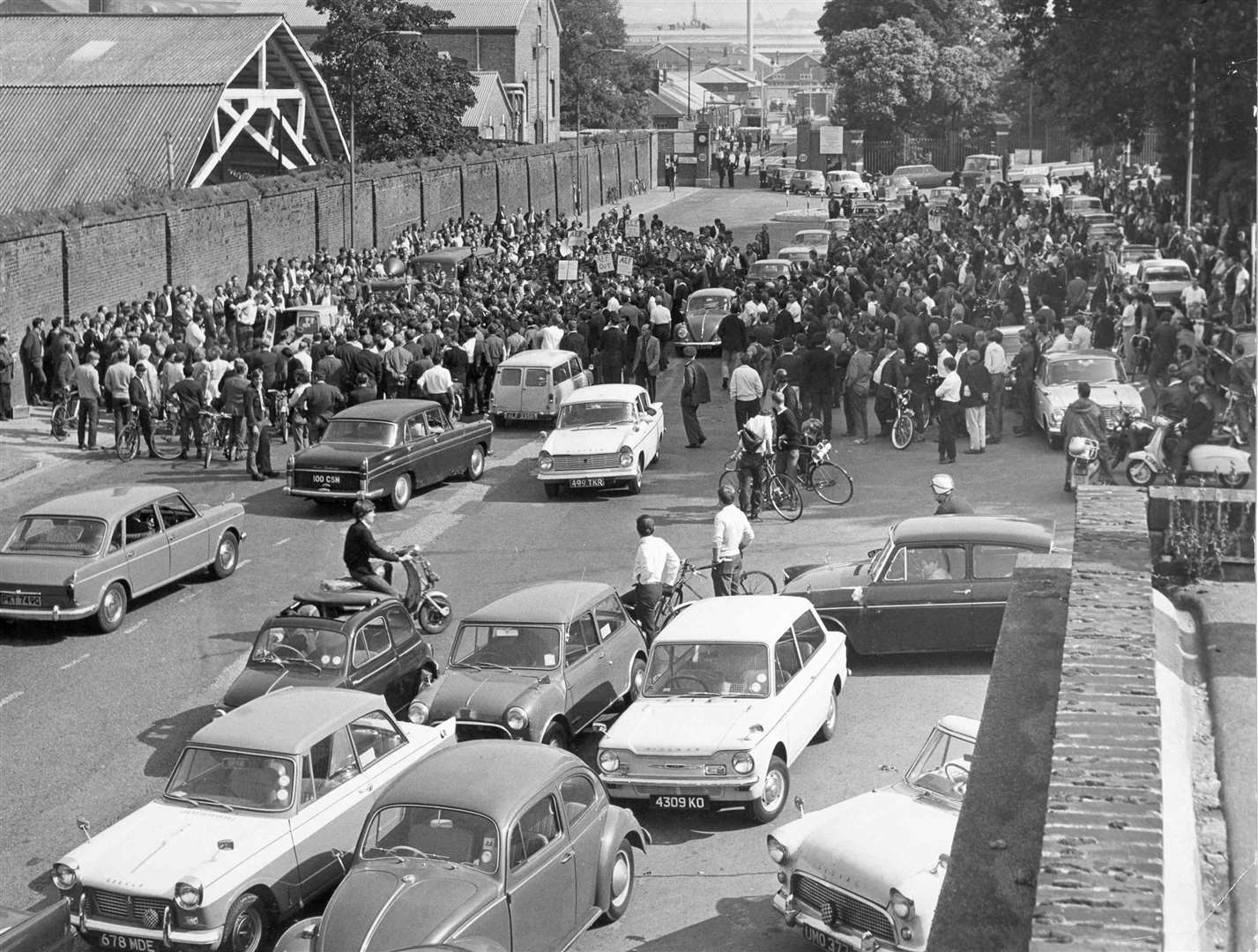 There were plenty of cars by 1969, but many of their drivers were prevented from entering Chatham Dockyard on this occasion by a massed gathering of strikers