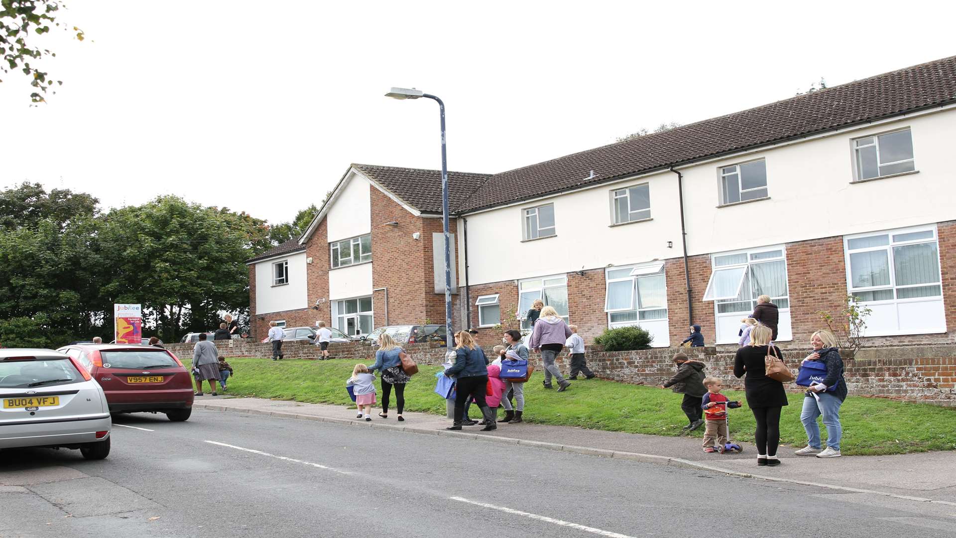 Picking-up time at the school in Gatland Lane