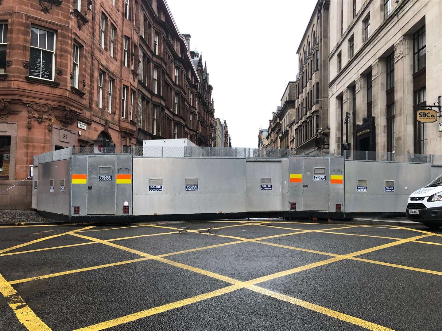 Police barriers at the scene in West George Street, Glasgow, on Monday (Douglas Barrie/PA)