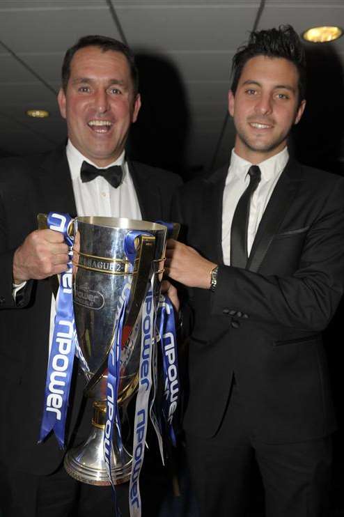 Martin Allen and son Charlie Allen with the League 2 trophy