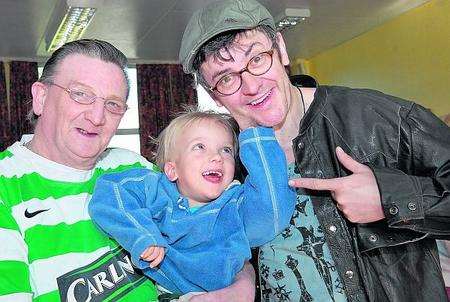 Chairman of Medway Emerald Group Stewart Hood, three-year-old Samuel Sims and comedian Joe Pasquale.