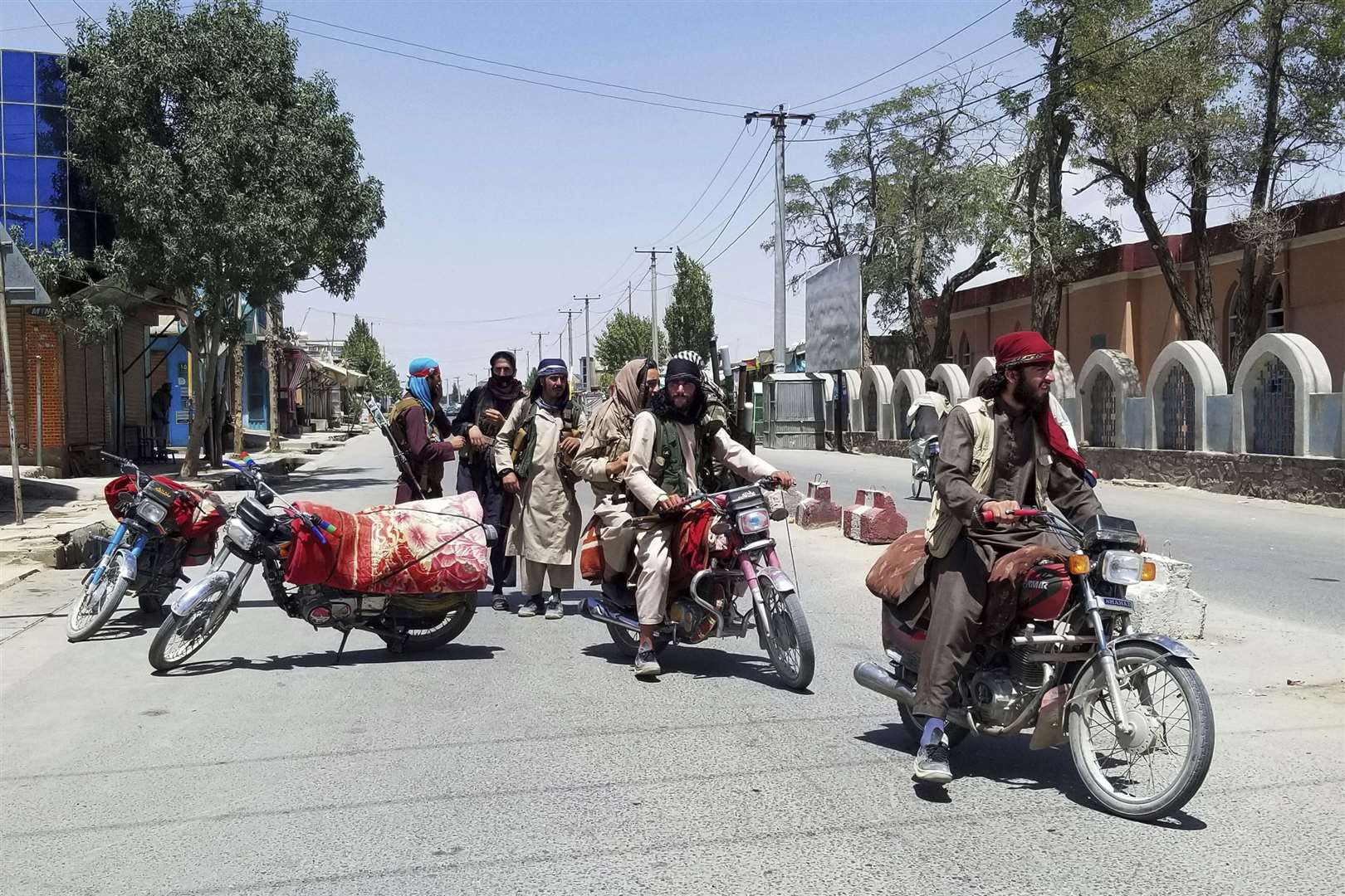 Taliban forces controlled all key cities in Afghanistan except Kabul by Sunday morning (Gulabuddin Amiri/AP)