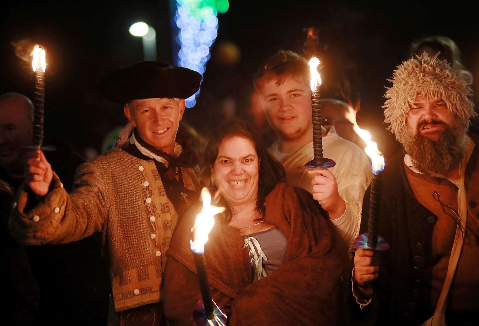 Captain Cutlass, right, and the Sheppey Pirates helped light up Queenborough's annual Christmas lantern parade on Sunday. Picture: Phil Lee