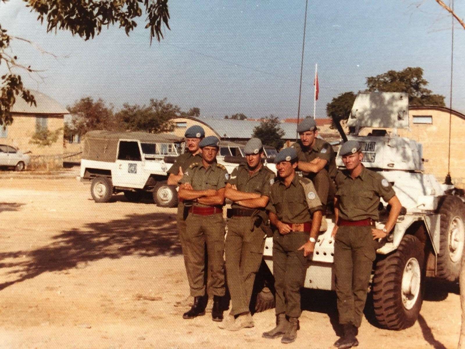 Derek Bennett, back, sitting on a UN peacekeeping vehicle in Cyprus (David Wooliscroft/PA)