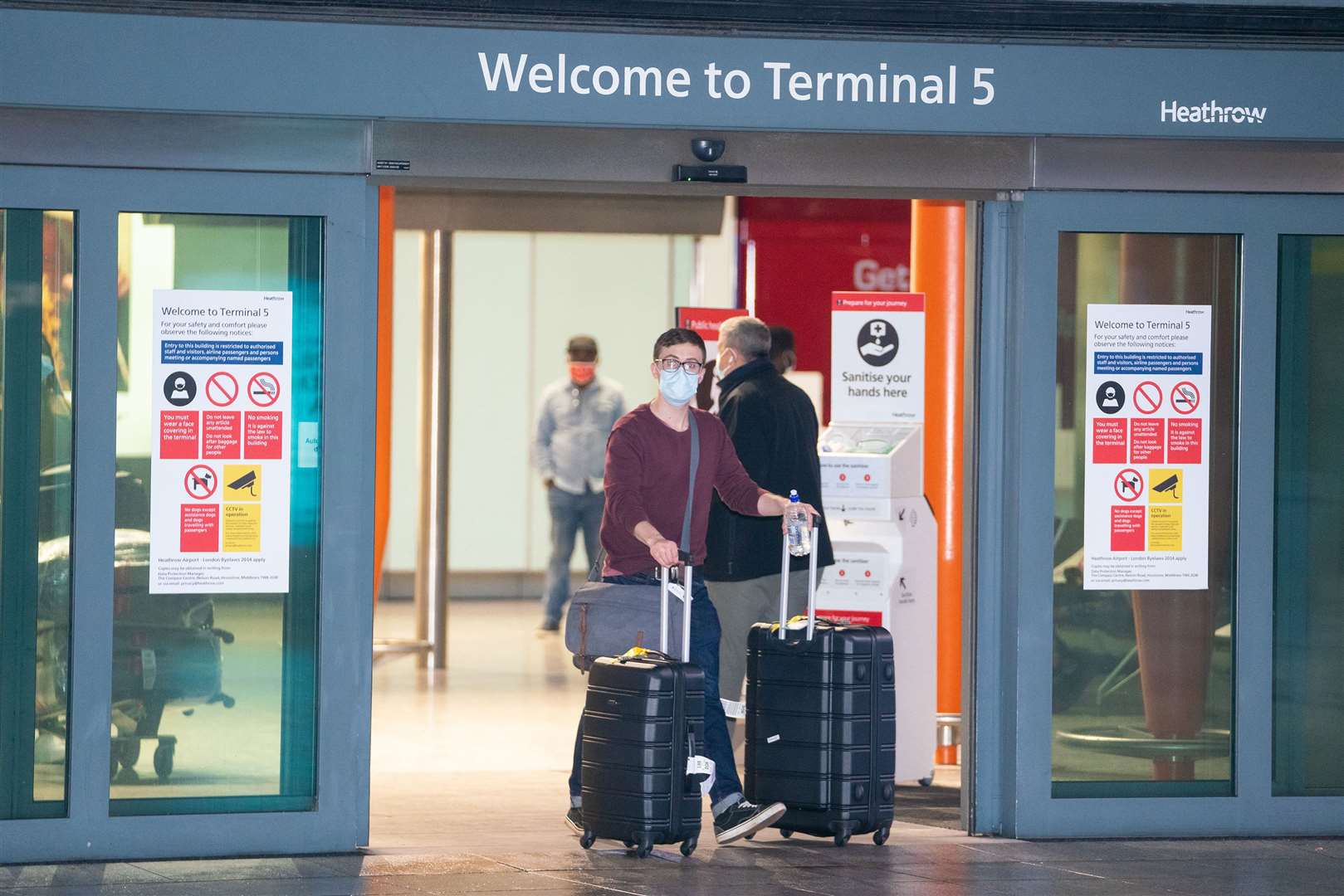 Passengers arrive at London Heathrow’s Terminal 5 (Dominic Lipinski/PA)