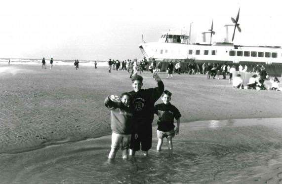 Youngsters paddling mid channel