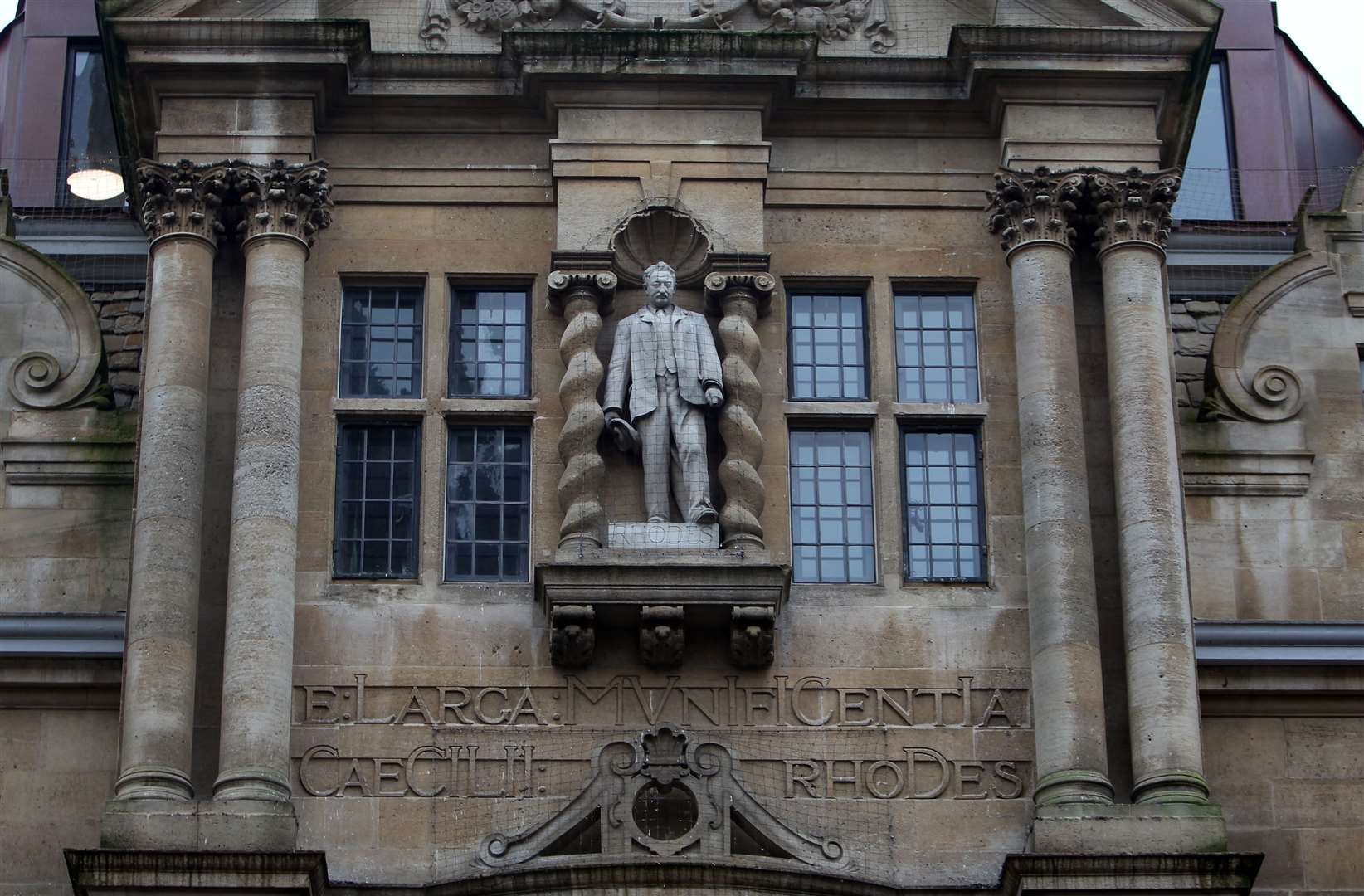 The statue mounted on Oriel College of British imperialist Cecil Rhodes (Steve Parsons/PA)