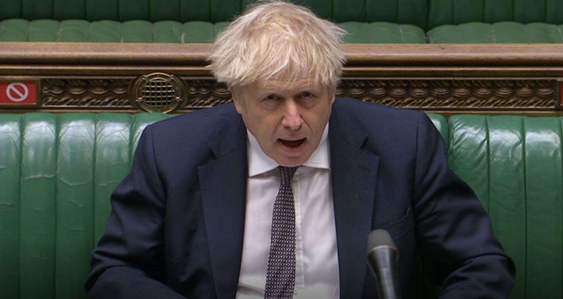 Prime Minister Boris Johnson speaks during PMQs in the House of Commons (PA)