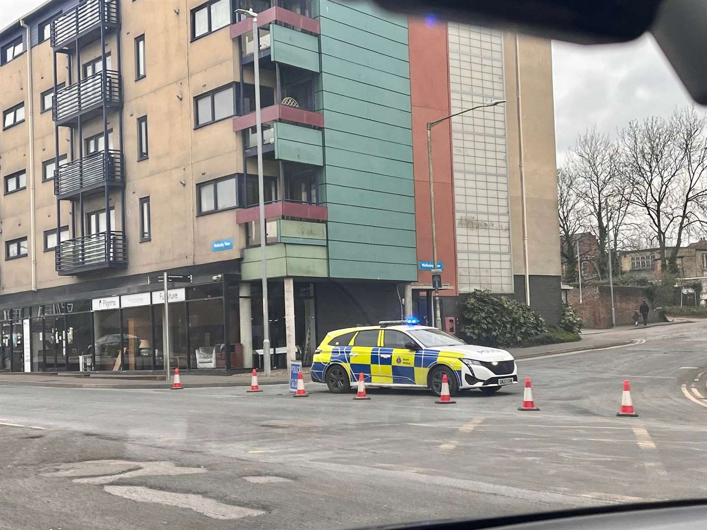 Police outside JD Wetherspoon in Ashford High Street