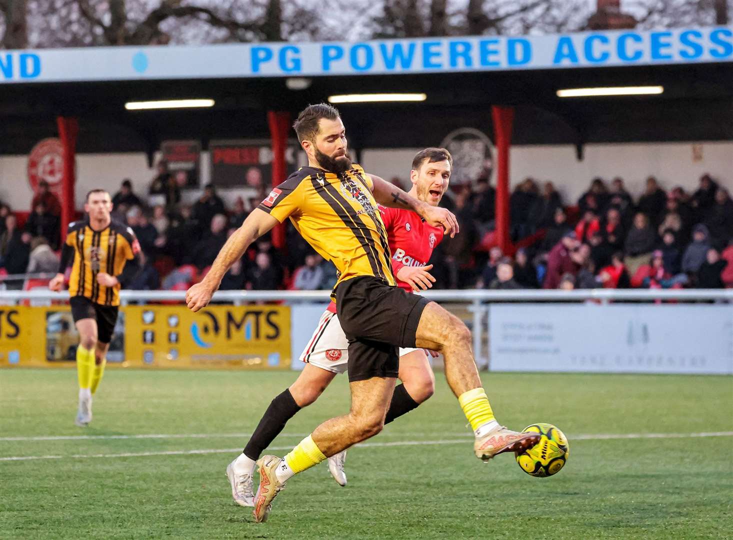 Folkestone midfielder Joe Turner goes through to make it 1-1 at Maidstone Road. Picture: Helen Cooper