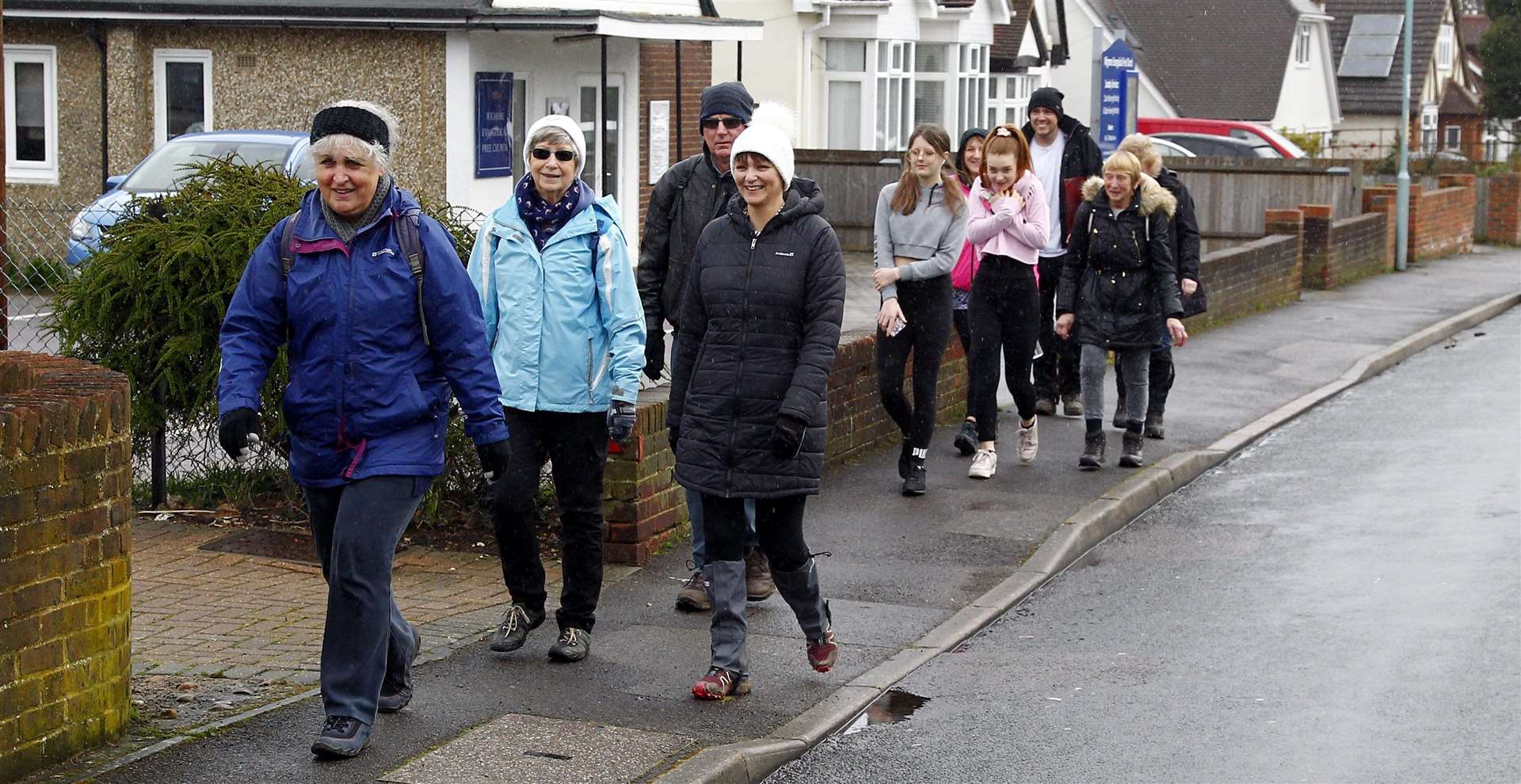 The group braved the conditions in aid of physical health. Picture: Sean Aidan