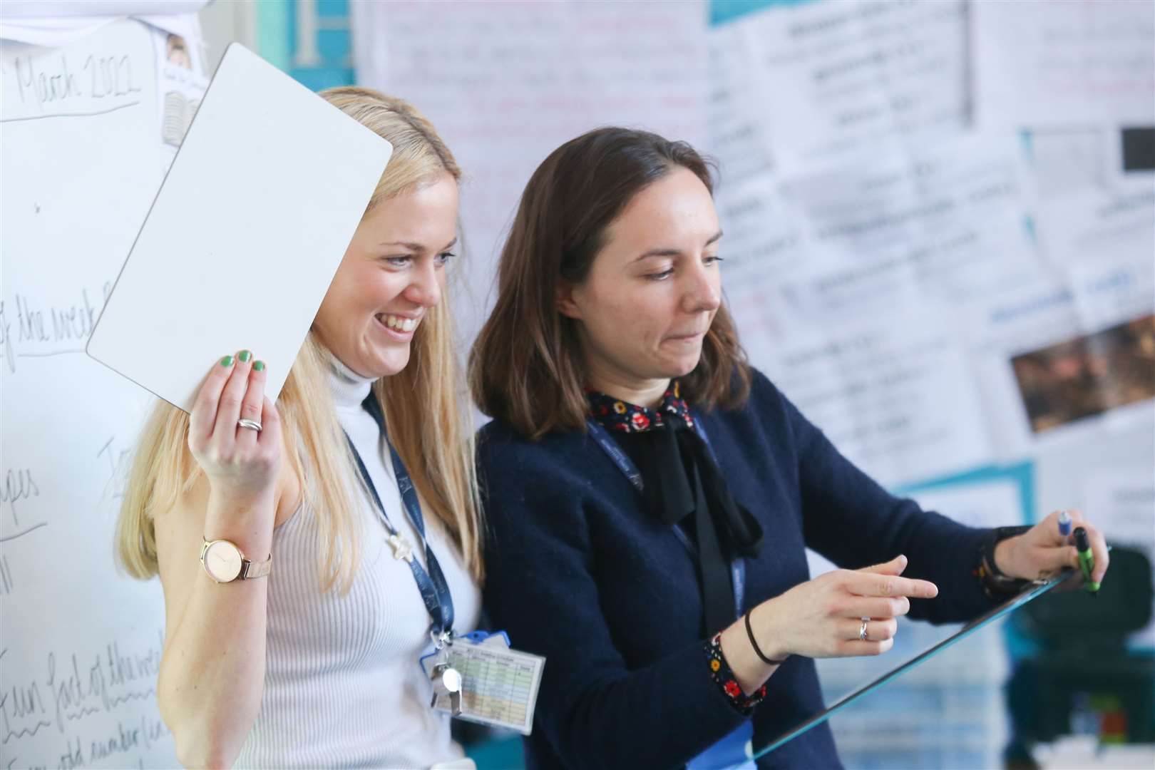 Katie Juckes is supported by her mentor Skaiste Anuzyte-Becker in delivering a Year 4 maths lesson at King Solomon Academy (PA)