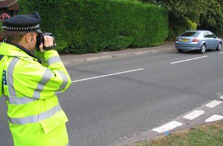 A photo of an officer conducting these checks is attached. Picture: Kent Police