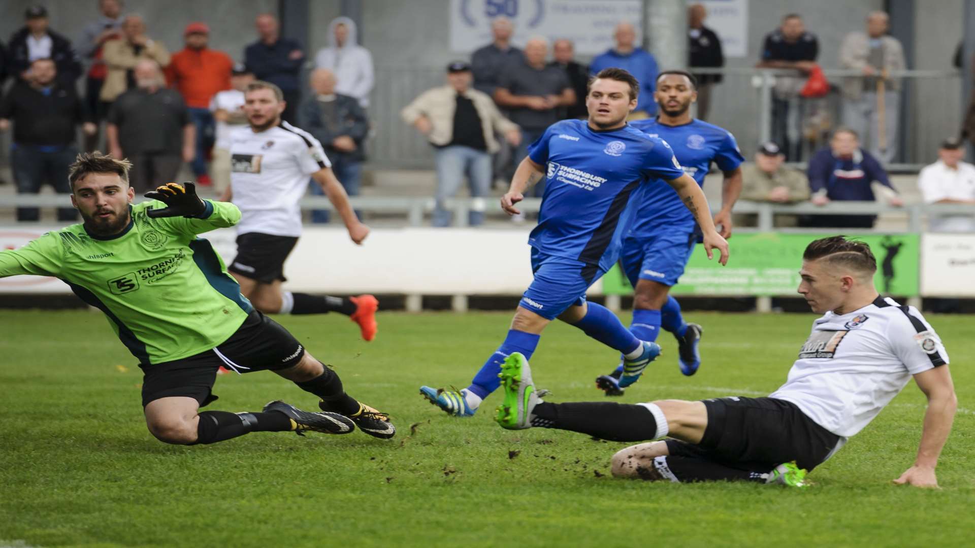 Andy Pugh slides in for Dartford's second goal Picture: Andy Payton